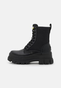 ASPHA COM - Bottines à plateau - black
