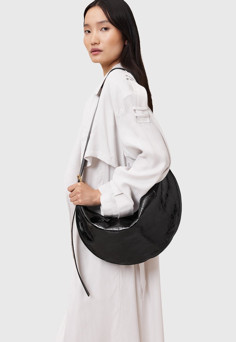 AllSaints HALF MOON SHOULDER - Handväska - black shine