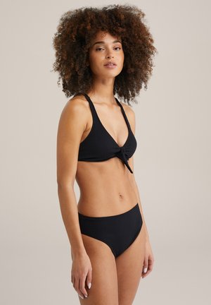 Svart ribbat bikinit-set som har en knyt-fram bralette med justerbara axelband och höga bikiniunderdelar för en smickrande passform.