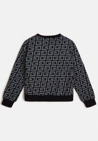 Felpa nera con un motivo geometrico grigio ripetuto. Collo e polsini a coste, con un bordo nero solido in vita.