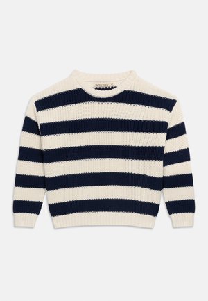 Pull tricoté col rond avec larges rayures horizontales bleu marine et crème, poignets et ourlet côtelés.