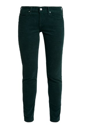 Mørkegrønne corduroy bukser med slim fit, klart ribbet tekstur, fem lommer samt metal knap- og nitterdetaljer.