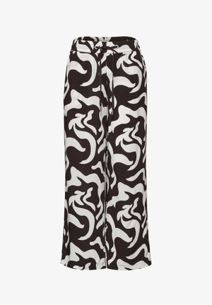 Pantalon large noir et blanc avec un motif abstrait tourbillonnant et une taille élastique avec cordon de serrage.