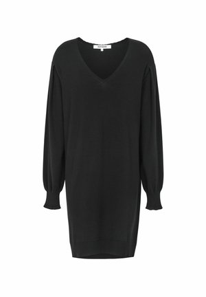 Svart oversized tröjdress med V-ringning, långa puffärmar och ribbade manschetter. Mjuk tyg med en slät yta och sprund i fållen.