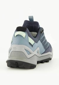 Blau- und graue Wanderschuhe mit einem strukturierten Obermaterial, kontrastierenden Fersen und einer robusten schwarzen Laufsohle. Mit einem Zugband und gewebten Akzenten.