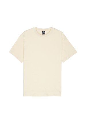 Kremowy T-shirt z krótkim rękawem wykonany z miękkiej bawełny; posiada okrągły dekolt i luźny fason, bez widocznych wzorów czy ozdób.