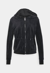 Haut à capuche zippé en velours noir avec une poche avant, capuche à cordon et poignets côtelés. Texture lisse avec une coupe ajustée.