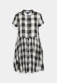 Robe à manches courtes noire et blanche à carreaux, avec un col, fermeture à boutons sur le devant et une taille froncée, fabriquée en tissu léger.