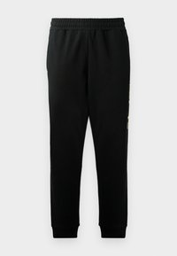 TRAIN LOGOSERIES - Tracksuit bottoms - black