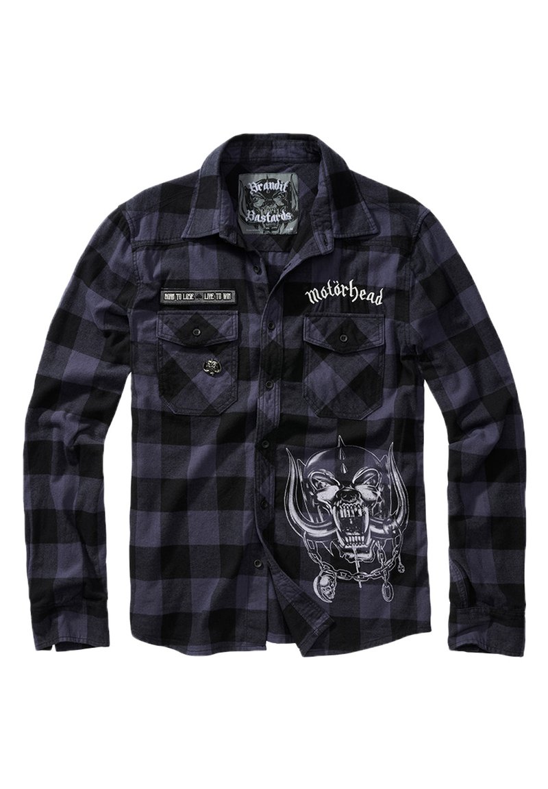 Camicia in flanella a scacchi neri e viola con maniche lunghe, caratterizzata da toppe ricamate e una grafica di un teschio con corna sulla parte anteriore.