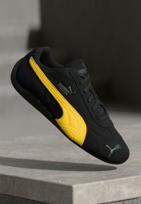 Puma SPEEDCAT UNISEX Baskets basses black/pele yellow/noir