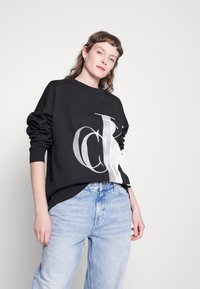 Calvin Klein Jeans LIGHTBOX - Sudadera - black
