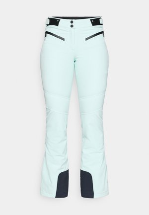 Heledamint värvi suusapüksid, valmistatud pehmest materjalist. Omavad kahte lukuga esikotti ning musti detaile vööl ja alajalgadel.