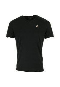 T-shirt noir à manches courtes et col rond avec un petit logo doré Le Coq Sportif sur la poitrine gauche.