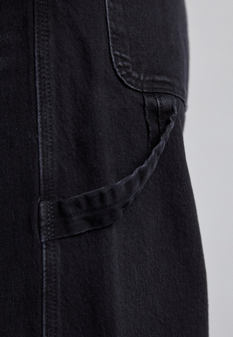RE/DONE PAINTER JEAN - Relaxed fit jeans - crafted black