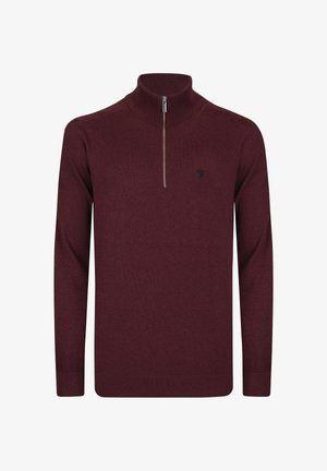 Sudadera con cremallera en color burdeos, fabricada en un tejido suave, con cuello alto, mangas largas y un pequeño logotipo negro en el pecho.