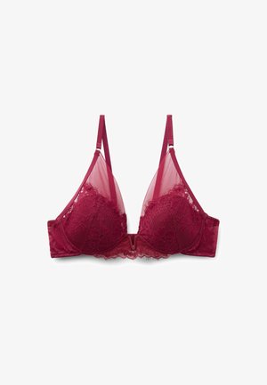 Krajková bordó podprsenka s průhlednými panely, V tvarovaným středem, nastavitelné ramínka a květinové krajkové detaily na košíčcích. Měkká texturovaná tkanina.