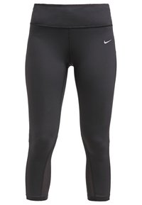 Leggings deportivos negros hechos de material elástico. Presentan una cintura alta, un diseño ajustado y un logo sutil en la parte delantera.