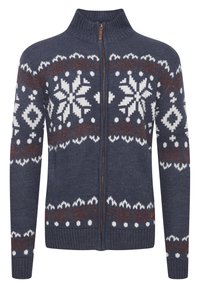 Marineblauer Reißverschluss-Pullover mit hohem Kragen, der weiße und rostfarbene geometrische Muster, eine Strickstruktur sowie gerippte Bündchen und Saum aufweist.