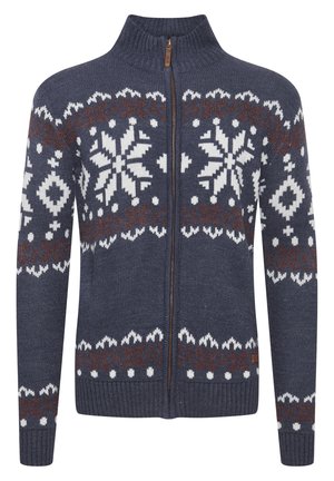 Maglione zip-up blu navy con colletto alto, caratterizzato da motivi geometrici bianchi e ruggine, texture a maglia e polsini e orlo a coste.
