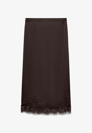 Czarna satynowa spódnica z koronkowym zdobieniem przy dolnej krawędzi. Posiada prostą sylwetkę oraz dwie boczne kieszenie dla większej funkcjonalności.