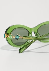 Swarovski Päikeseprillid - transparent green
