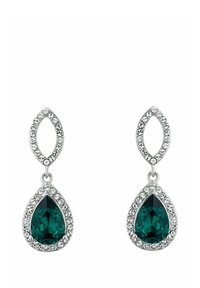 Tårdroppörhängen har en central djupgrön ädelsten omgiven av klara glittrande stenar, i en metall med silverton.
