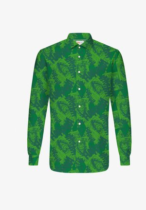Majica dugih rukava s vibrantnim zelenim uzorkom, na kojem se nalaze tamnije zelene apstraktne forme i lica, sa bijelim gumbima sprijeda.