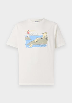 White cotton t-shirt featuring a playful print of fish and a lighthouse, with "new balance" text in blue below the illustration.