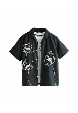 Black short-sleeve button-up shirt with white abstract flower line drawings and white T-shirt underneath.