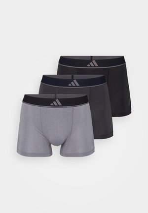 Zestaw trzech męskich majtek typu boxer w kolorze szarym i czarnym, z elastycznymi pasami w talii z logo oraz gładką, rozciągliwą fakturą materiału.