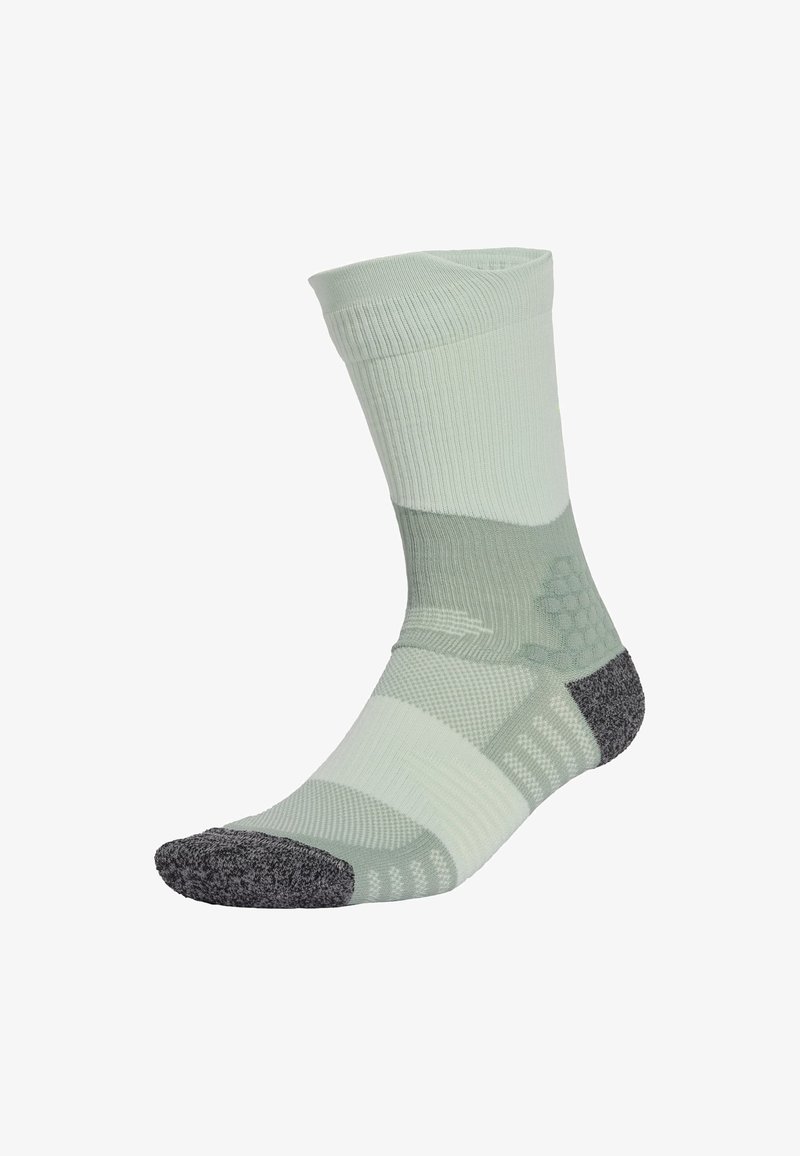 Light green sock with a textured knitted design, featuring a gray reinforced toe and honeycomb pattern for grip. Compression fit at the cuff.