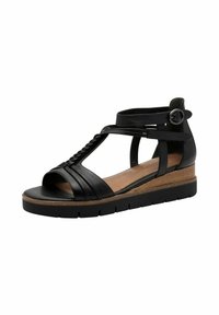 Sandal in pelle nera con dettagli intrecciati, punta aperta e suola a zeppa. Presenta una cintura regolabile e accenti con texture legno.