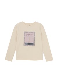 Cremfarbendes Langarmshirt mit einem grafischen Design, das den Eiffelturm und das Wort "bonjour!" vor einem pinken, gemusterten Hintergrund zeigt.