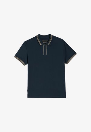 Granatowa koszulka polo z krótkim rękawem, z beżowym paskiem na kołnierzyku i na brzegach rękawów oraz krótkim zapięciem na zamek z przodu.