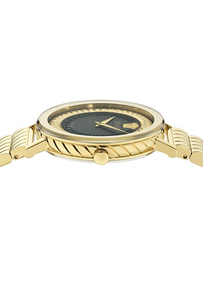 Kuldne randmoodul musta kelladialiga, kuldsed käed, Medusa pea logo ja mustriga raam, millel on tekstureeritud kuldne metallist rihm.