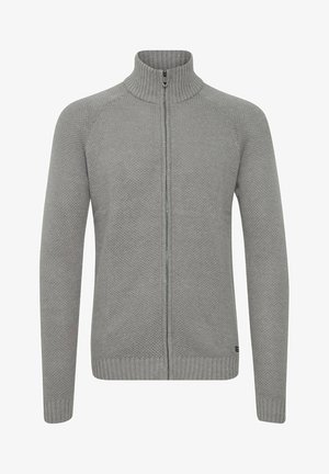 Sweat à fermeture éclair gris clair avec un col montant, un tissage texturé, des poignets côtelés et un ourlet droit. Fermeture à l'avant avec une fermeture éclair.