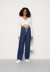 Dr.Denim DONNA - Calças de ganga de corte relaxado - pebble dark retro