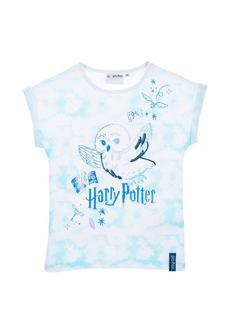 Camiseta blanca con patrón de teñido anudado azul. Presenta un gráfico de un búho volador y el texto "Harry Potter" en azul. Mangas cortas y enrolladas.