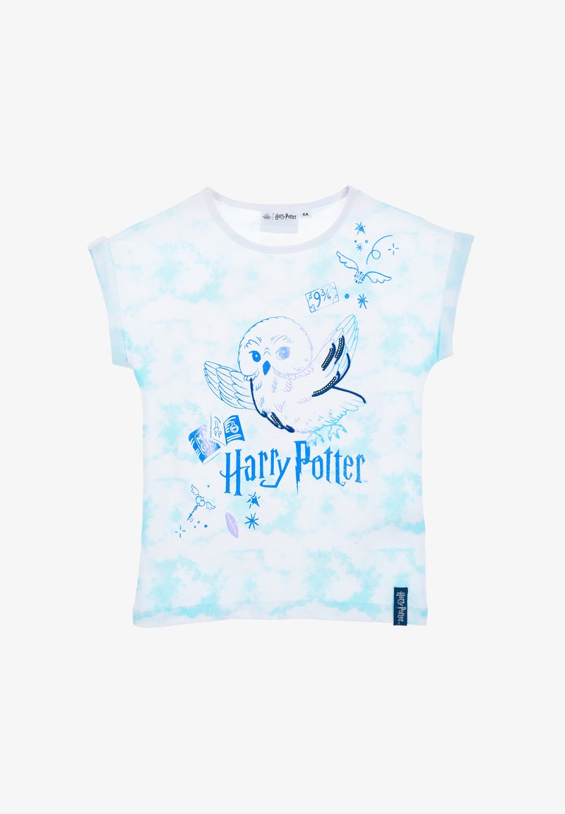 Camiseta blanca con patrón de teñido anudado azul. Presenta un gráfico de un búho volador y el texto "Harry Potter" en azul. Mangas cortas y enrolladas.