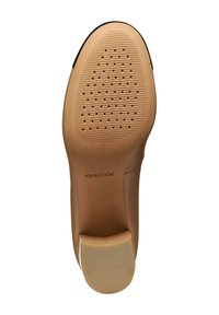 Tan rubber sole with textured, perforated design. Sturdy heel with contrasting rounded accent. "GEOX" branding near heel edge.