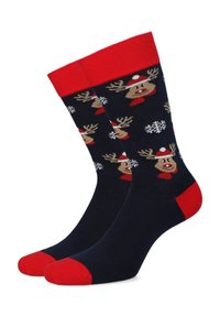 Granatowe skarpety z czerwonymi akcentami, przedstawiające renifery w czapkach i szalikach. Wzór uzupełniają białe płatki śniegu.