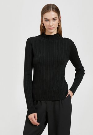 - Sweter