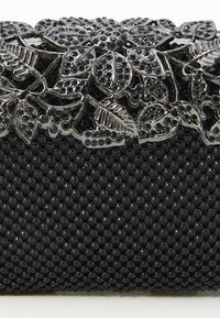 Mascara RÍOGHNACH - Delninukė - black