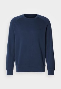 Felpa blu navy in cotone, con maniche lunghe, colletto a girocollo e un logo in rilievo discreto sul petto. Polsini e orlo a coste.