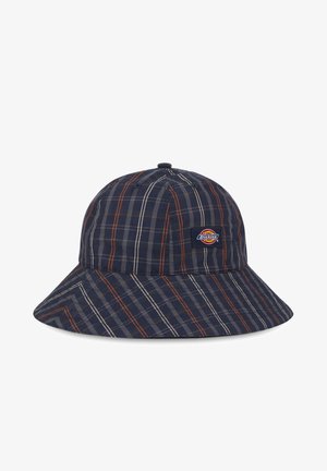 Καπέλο bucket σε ναυτικό καρό, με πορτοκαλί και λευκές ρίγες. Κατασκευασμένο από μαλακό ύφασμα με φαρδύ γείσο. Λογότυπο στο μπροστινό μέρος.