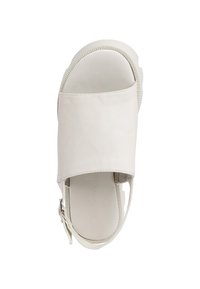White leather sandal featuring an open toe design, wide upper strap, and adjustable heel buckle. Textured sole for grip.