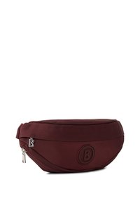 Marsupio bordeaux realizzato in un tessuto liscio e resistente. Caratterizzato da una forma arrotondata, una cintura ampia, un logo impresso e un accento in zip argentato.