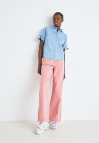 Lee STELLA - Široke nogavice - cassie pink