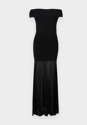 Sort off-shoulder aftenkjole med tætsiddende korset og plisseret, gennemsigtigt skørt, der går til gulvlang.